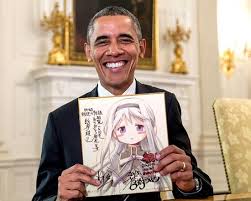 色紙をもらって喜ぶオバマ大統領